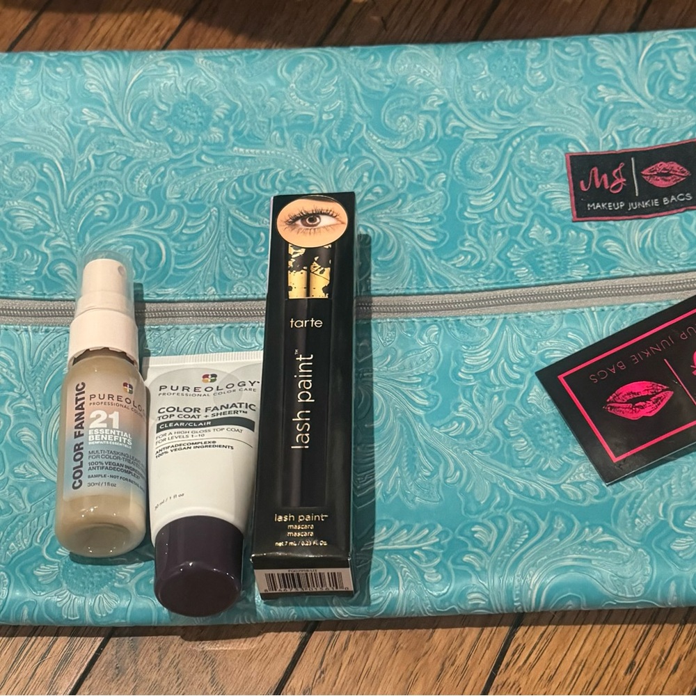 Large makeup junkie bag nwt with makeup , hair care